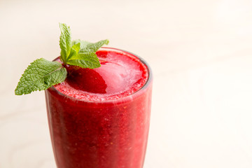 cherry shake with frozen pulp and mint