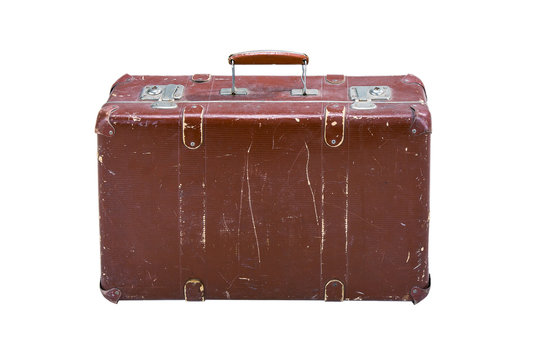 Old worn suitcase on a white background isolated
