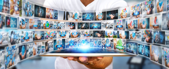 Businessman switching pictures on modern interface