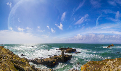 View of distant planet system from cliffs