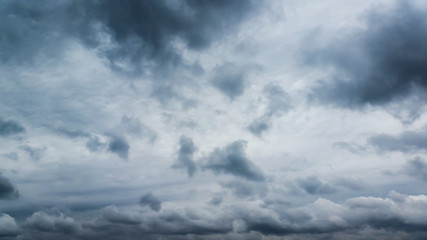 Obraz premium Fluffy gray rain clouds in the sky