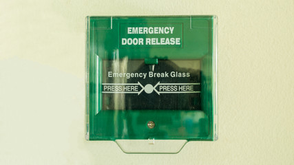 Emergency door release to escape from the room for safety by breaking glass