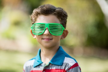 Young boy wearing shutter shades