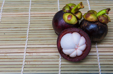 mangosteen Thai fruit delicious sweet  on a wooden background