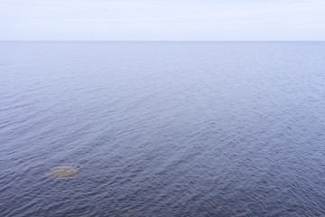 Small waves on the sea and the stone circles