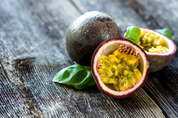 Delicious passion fruit on wooden background