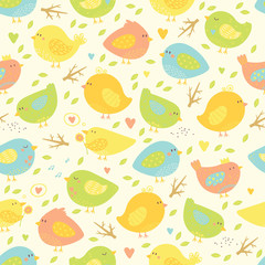 Seamless pattern with cute birds and tree branches.