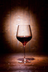 Wine glass on wooden background