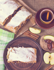 Apple strudel or apple pie  with dates and cinnamon
