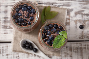 Fototapeta na wymiar chia chocolate pudding with blueberry