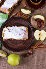 Apple strudel or apple pie  with dates and cinnamon