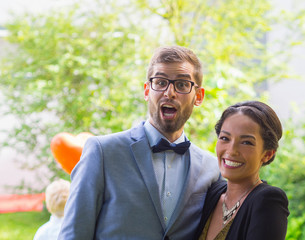 Couple portrait with evening attire having fun outdoor
