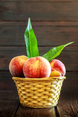 Peaches in weaved basket