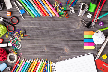 Various office supplies on desk with copy space