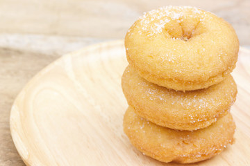 Donuts on wood plate