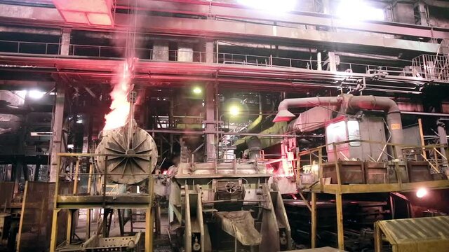 Metallurgical works, molten metall production at foundry factory. HD.