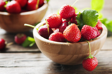 Sweet fresh strawberry on the wooden table