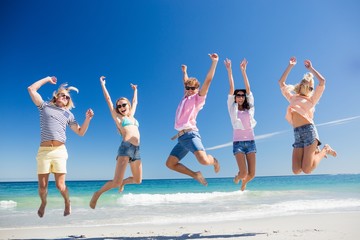  Portrait of friends posing at the beach