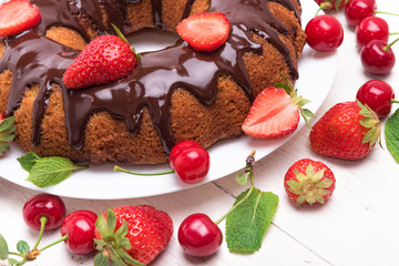 Homemade berry  cake with chocolate .