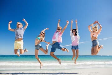  Portrait of friends posing at the beach