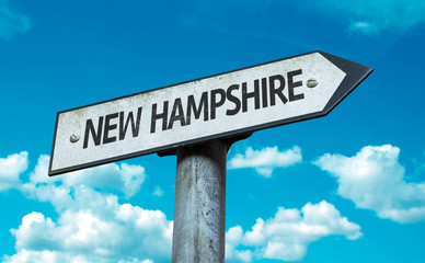 Fototapeta premium New Hampshire direction sign in a concept image