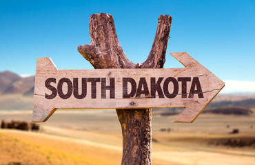 South Dakota wooden sign with desert background