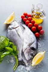 Delicious two fresh fish  with aromatic herbs, spices and vegeta