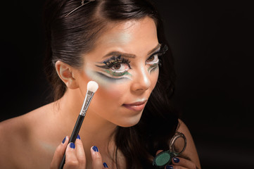 Obraz premium Beautiful makeup artist