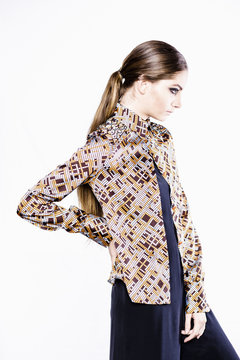 Stylish woman wearing patterned blouse