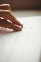 Readinn braille with hands - obrazy, fototapety, plakaty