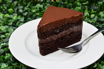 Delicious, soft sliced fresh homemade dark chocolate cake