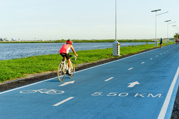 Fototapeta premium Bฺlue bicycle lane at Suvarnabhumi Airport in Bangkok ,Thailan