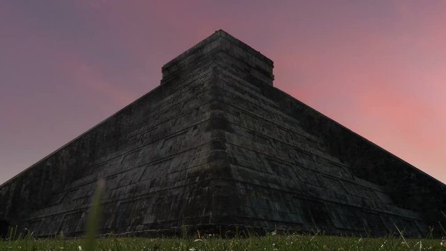 mayan kukulkan temple of chichen itza at sunrise no people timelapse zoom out