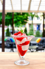 Ice cream with strawberry sauce