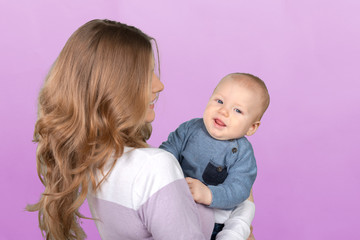 Happy young mother and her son