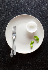 Empty Plate on black Marble