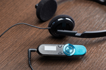 headphones on wooden background