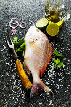 fresh Fish Menu with lime, parsley, olive oil, blue onion and wh