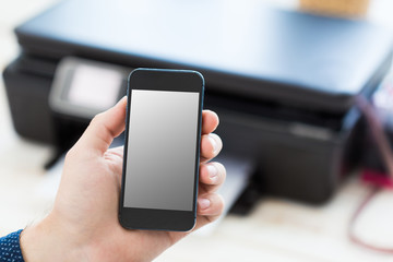 Unrecognizable man using mobile phone