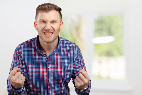 Portrait Of Angry Young Man