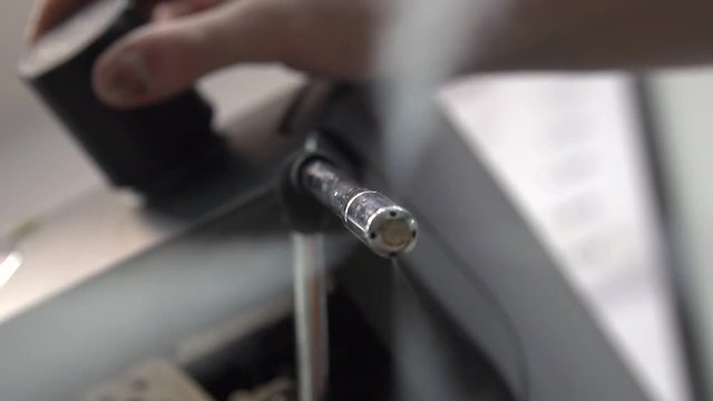 Steam from coffee machine in slow motion