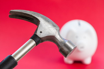 Piggy bank on red background