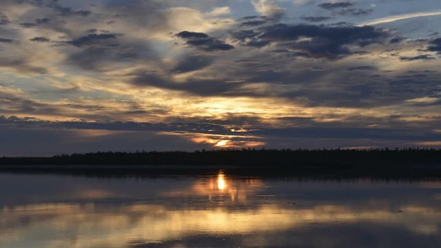 time-lapse photography of sunset over the river on the Yamal Peninsula