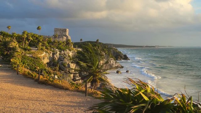 Establishing shot of mayan site of tulum at sunrise no people