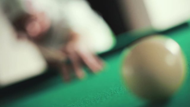 man playing pool at the cottage