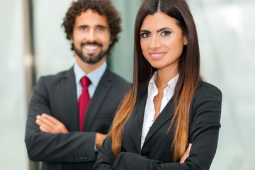 Portrait of two smiling business persons