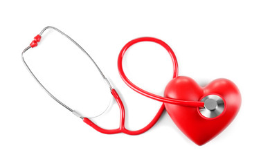 Red stethoscope and heart isolated on white