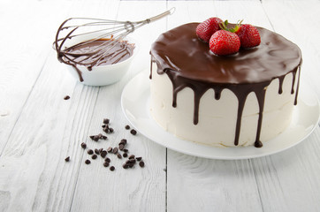 The process of making chocolate Cake filled with glaze. Birds milk.