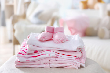 Fototapeta na wymiar Pile of baby clothes, close up