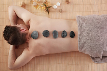 Man relaxing in spa salon